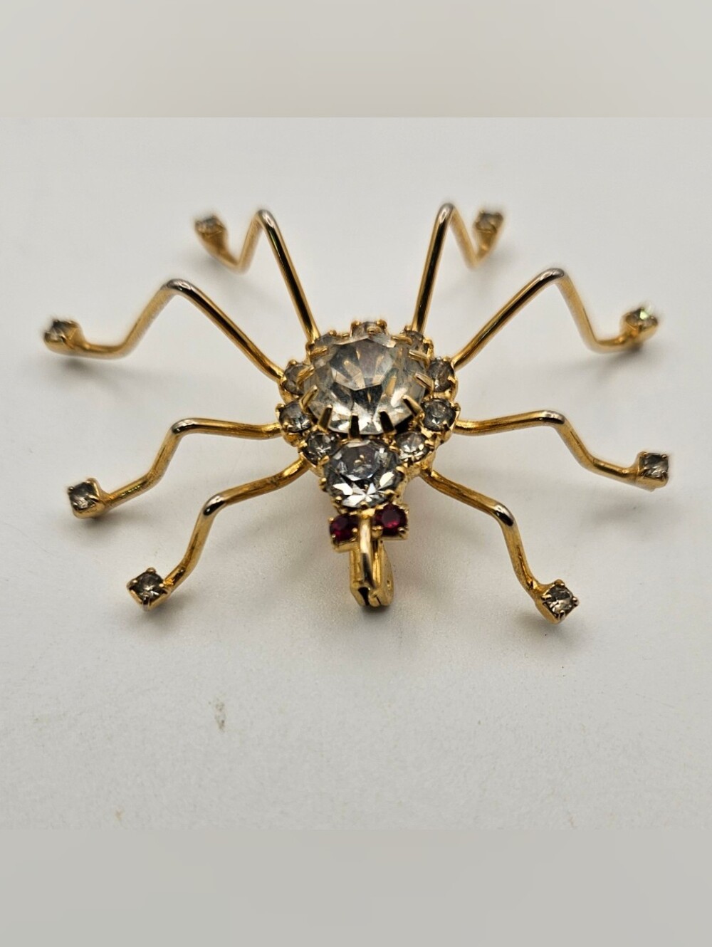 Vintage Gold Tone Rhinestone Spider Brooch Pin Red Eyes